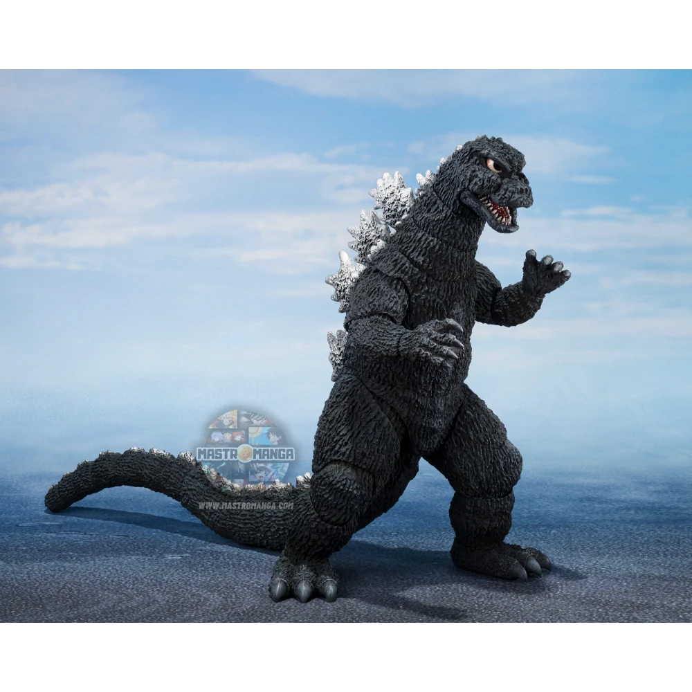 Action figure articolata S.H.MonsterArts di Godzilla versione 1975 di Bandai Tamashii Nations, con lo sguardo fiero dell'era Showa, scaglie dorsali grigie e corpo muscoloso in PVC