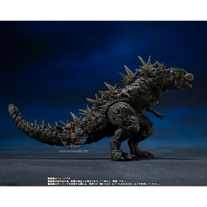 Action figure articolata S.H.MonsterArts di Godzilla 2023 nella forma di Odo Island Monster da Godzilla Minus One, con pelle rugosa marrone, fauci aperte e piccoli aculei dorsali