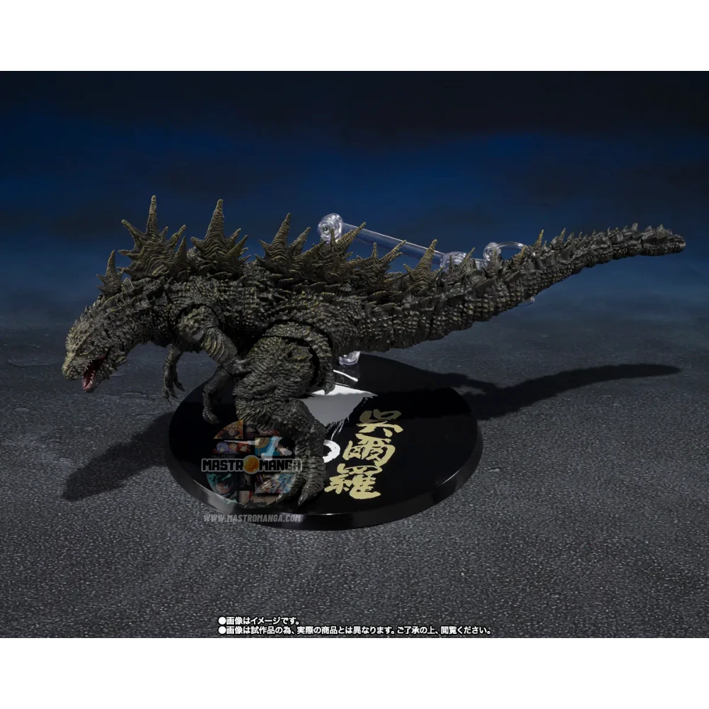 Action figure articolata S.H.MonsterArts di Godzilla 2023 nella forma di Odo Island Monster da Godzilla Minus One, con pelle rugosa marrone, fauci aperte e piccoli aculei dorsali