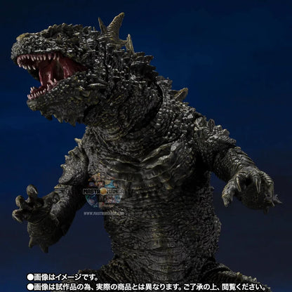 Action figure articolata S.H.MonsterArts di Godzilla 2023 nella forma di Odo Island Monster da Godzilla Minus One, con pelle rugosa marrone, fauci aperte e piccoli aculei dorsali